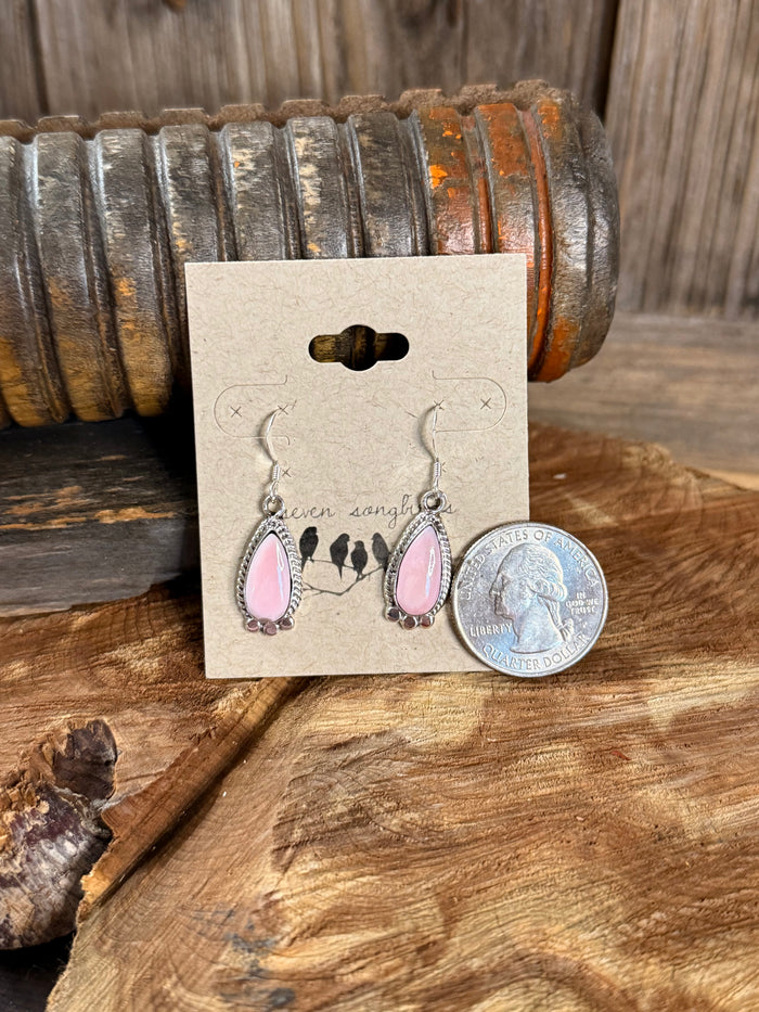 Pink teardrop fishhook earrings with silver filigree border and blue bead accents