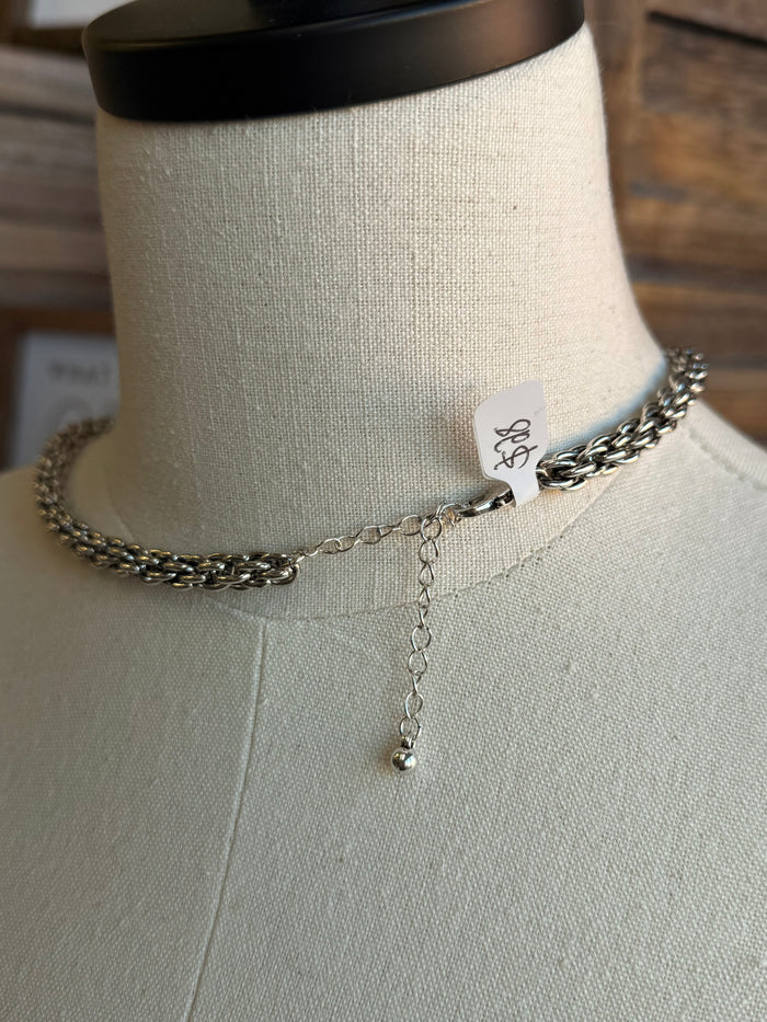 Chunky silver chain necklace with small charm pendant and short drop