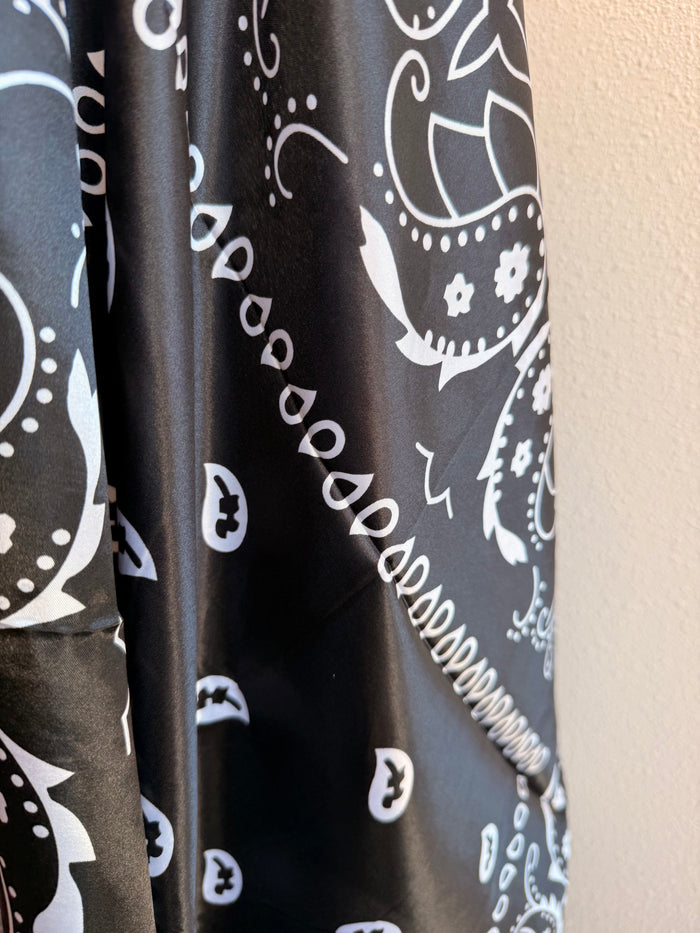 Wild rag scarf in black and white with paisley and star pattern, long folded section