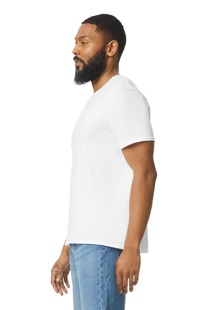 Side view of a man wearing a plain white cotton short-sleeved t-shirt and blue jeans on a white background