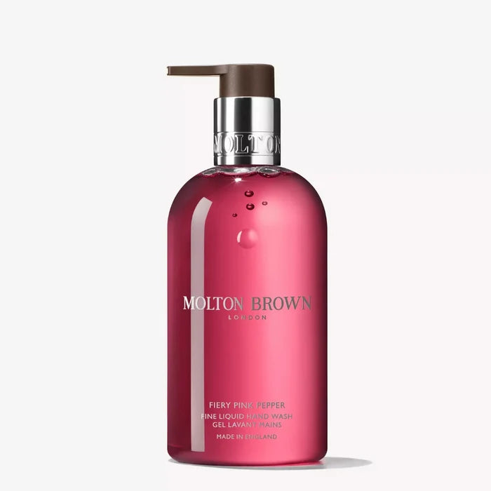Molton Brown pink hand wash bottle on a white background