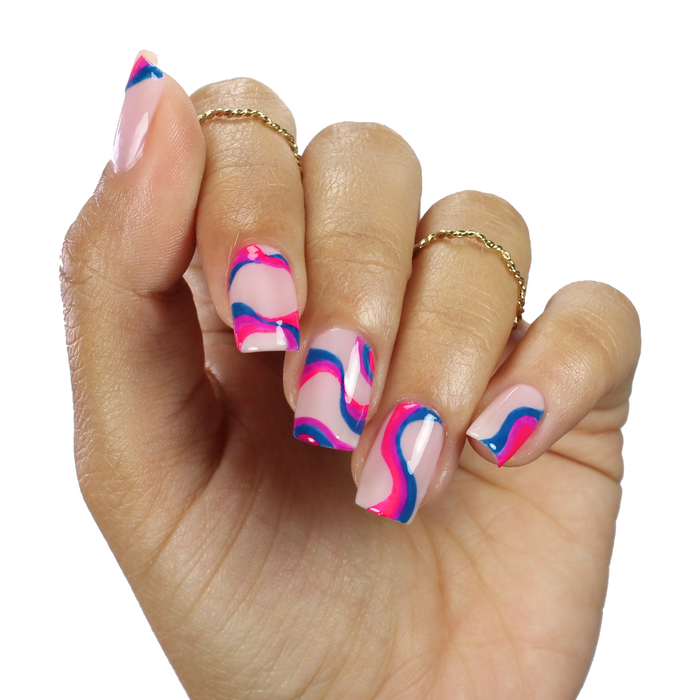 Summertime Sadness blue with pink and coral swirl nail art on a medium skin tone with rings