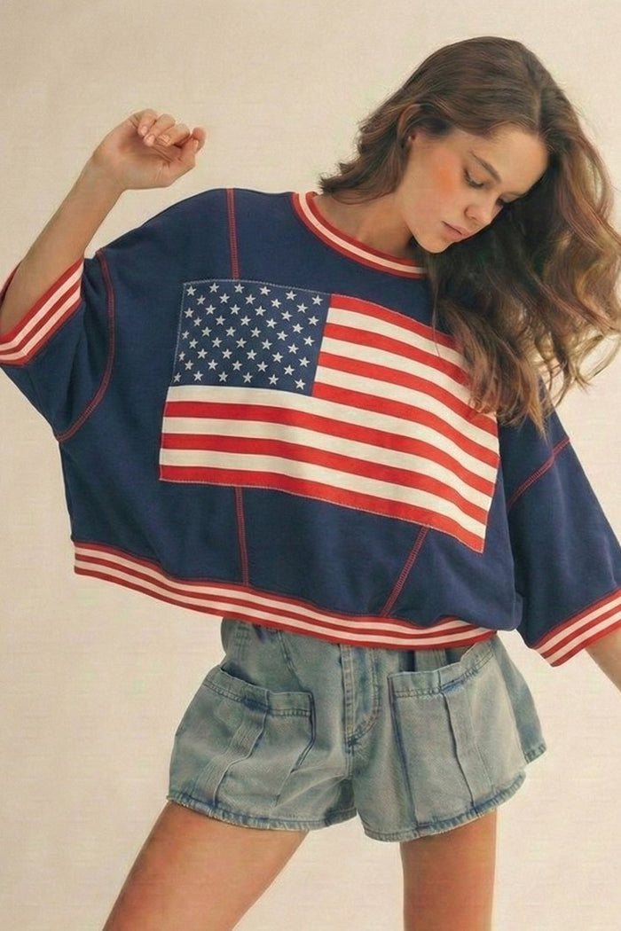 Navy short-sleeve sweatshirt with large USA flag graphic and red-white striped trim