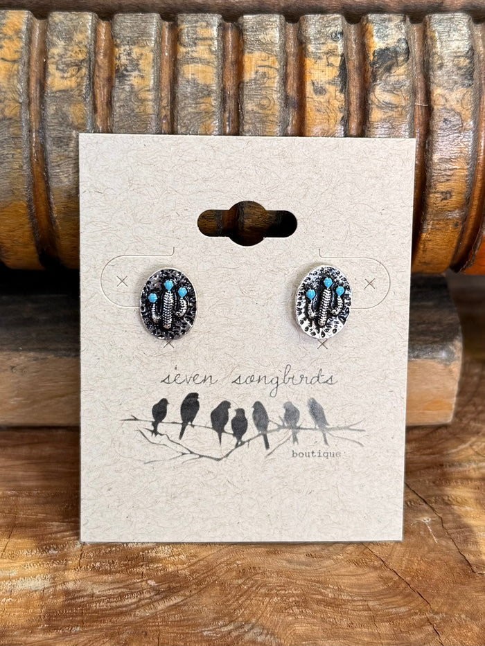 Turquoise oval stud earrings in dark silver-tone settings, small post backs