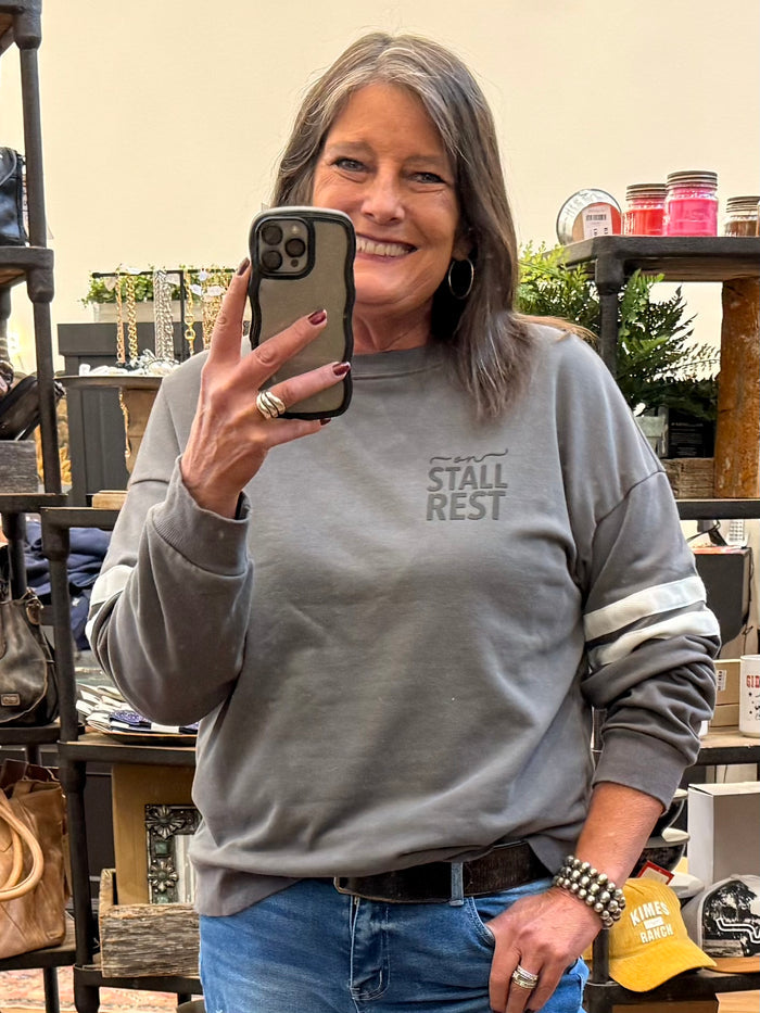 Gray sweatshirt with small chest 'STALL REST' logo