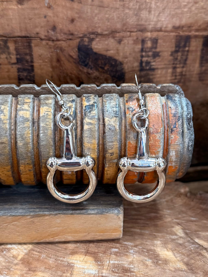 Pair of silver snaffle bit hoop earrings with dangling ring mouthpieces