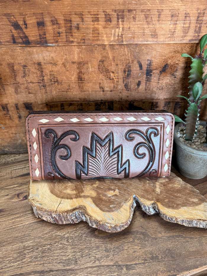 Hand-tooled leather checkbook wallet with feather and scroll tooling front panel