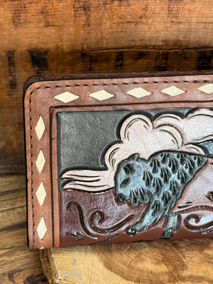 Hand-tooled leather wallet close-up: buffalo head tooling with diamond-studded edge