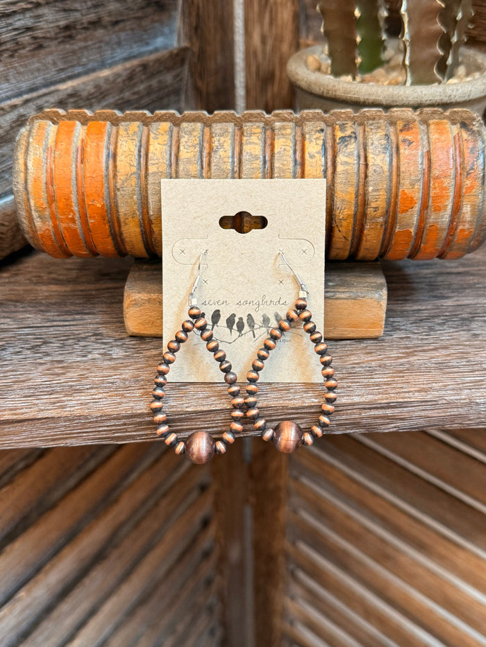 Copper beaded teardrop earrings with bronze hoops and dangling spheres