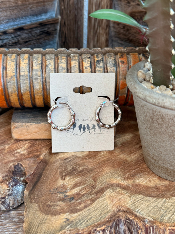 Silver textured stainless steel hoop earrings with stud backs