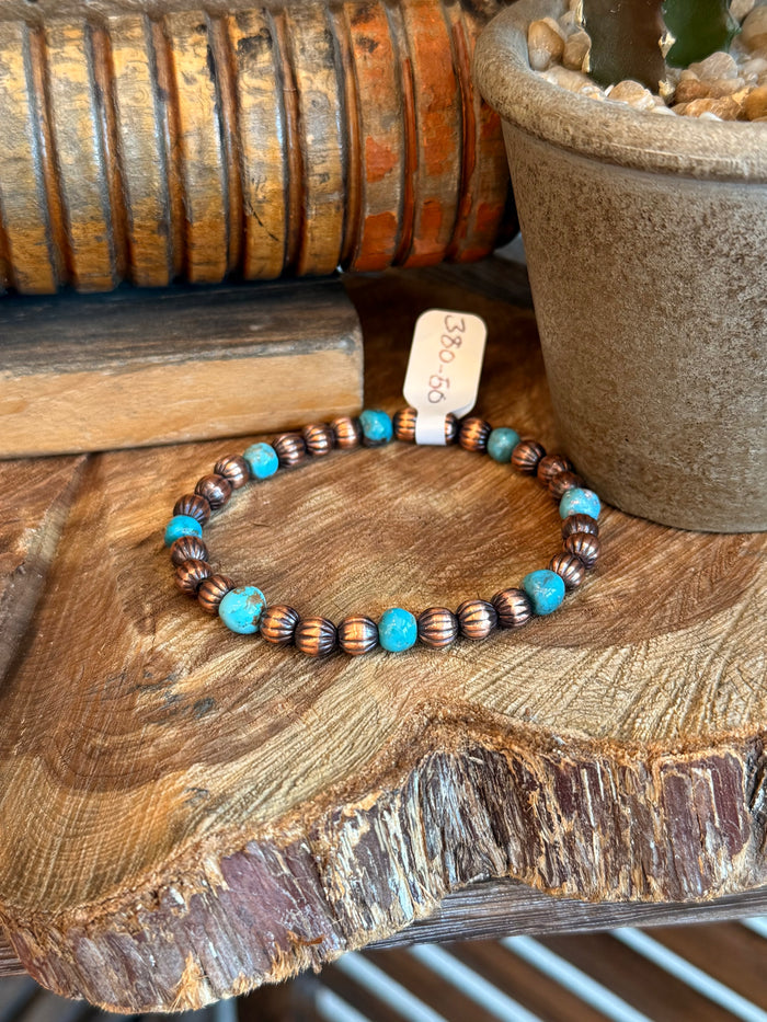 Turquoise and copper bead stretchy bracelet with round turquoise stones and ribbed copper beads
