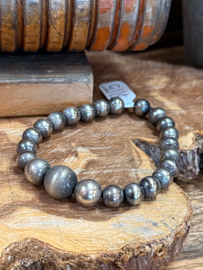 Sterling stretch bead bracelet, gray spherical beads with big center focal bead