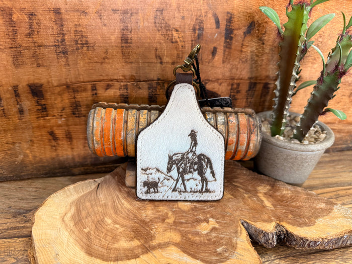 Cowgirl dog hair-on key fob, white patch with horse and dog silhouette, metal keyring