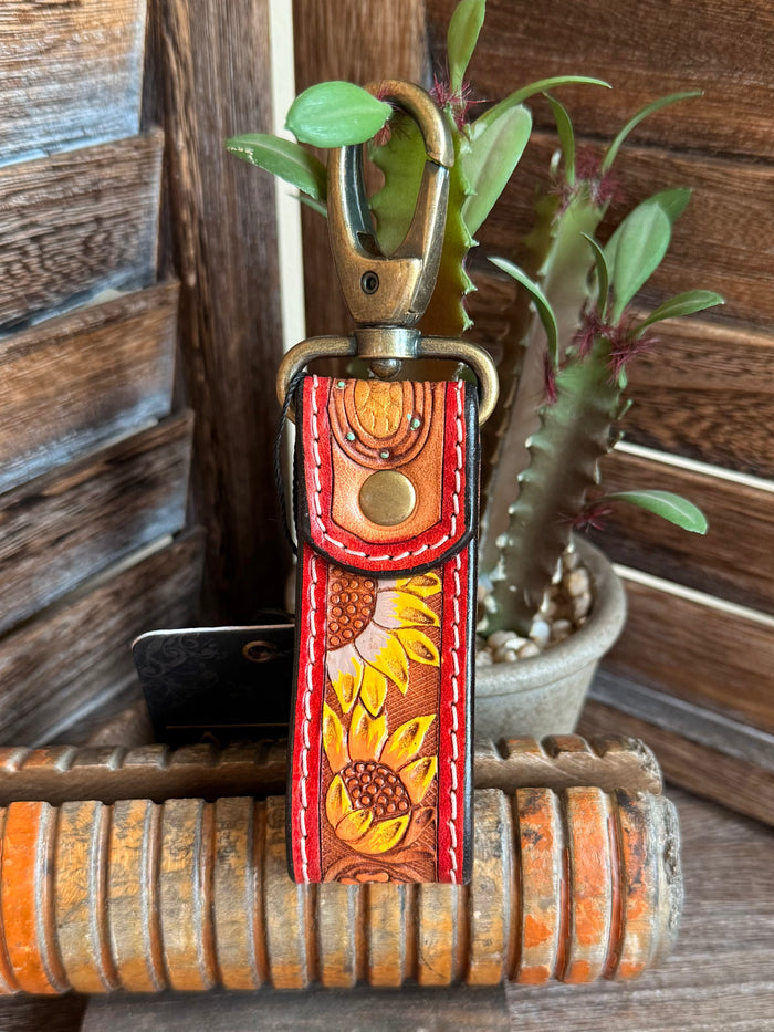 Tooled leather sunflower keychain, red and yellow floral tooling with brass key ring