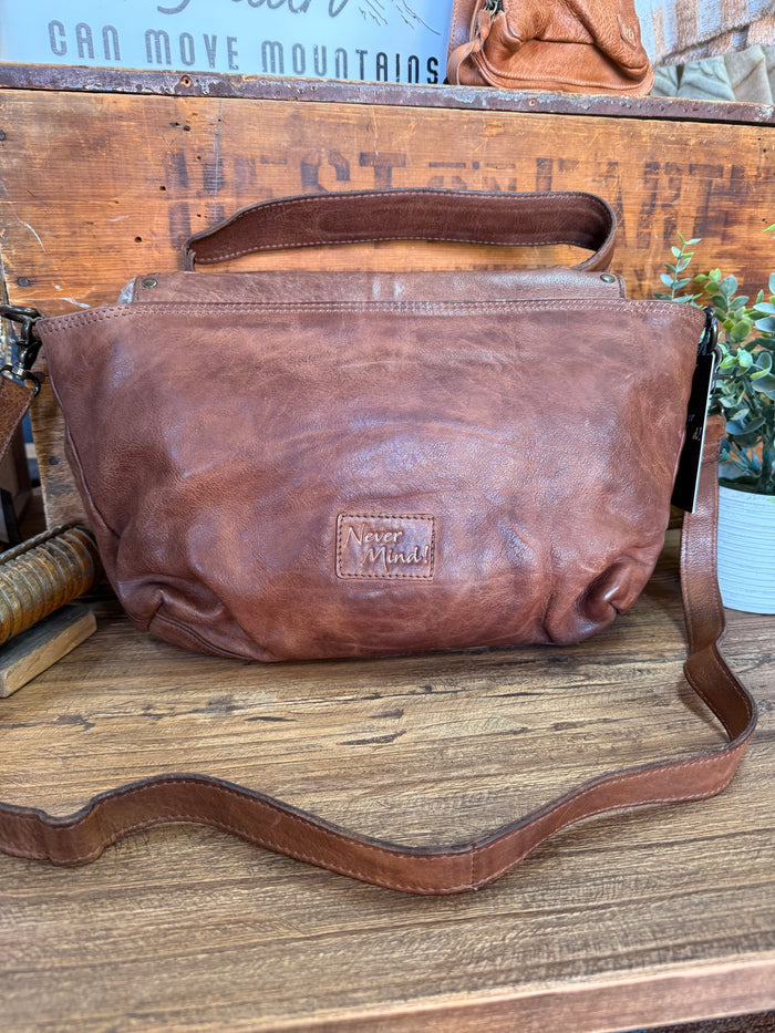 Chocolate leather crossbody purse back with embossed logo patch and shoulder strap