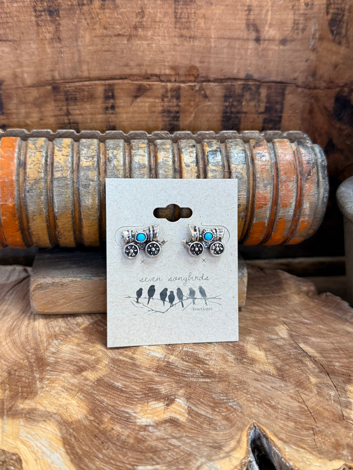 Wagon stud earrings on card: silver-toned round floral studs with turquoise side stones