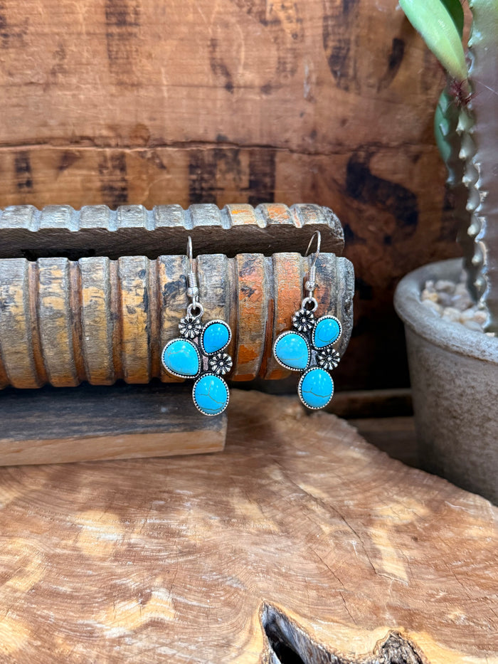 Silver-tone cactus cluster earrings with three turquoise round stones and hook backs