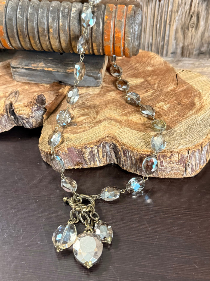 Clear crystal pendant necklace with faceted links and heart-shaped charm