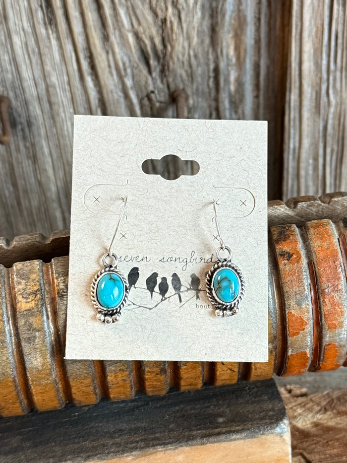 Sterling silver turquoise fishhook earrings, oval stones in decorative silver frames