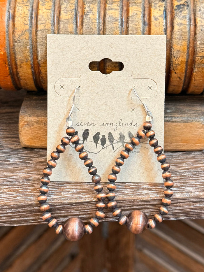Copper bead teardrop earrings on fishhook wires, multiple dangling bronze drops