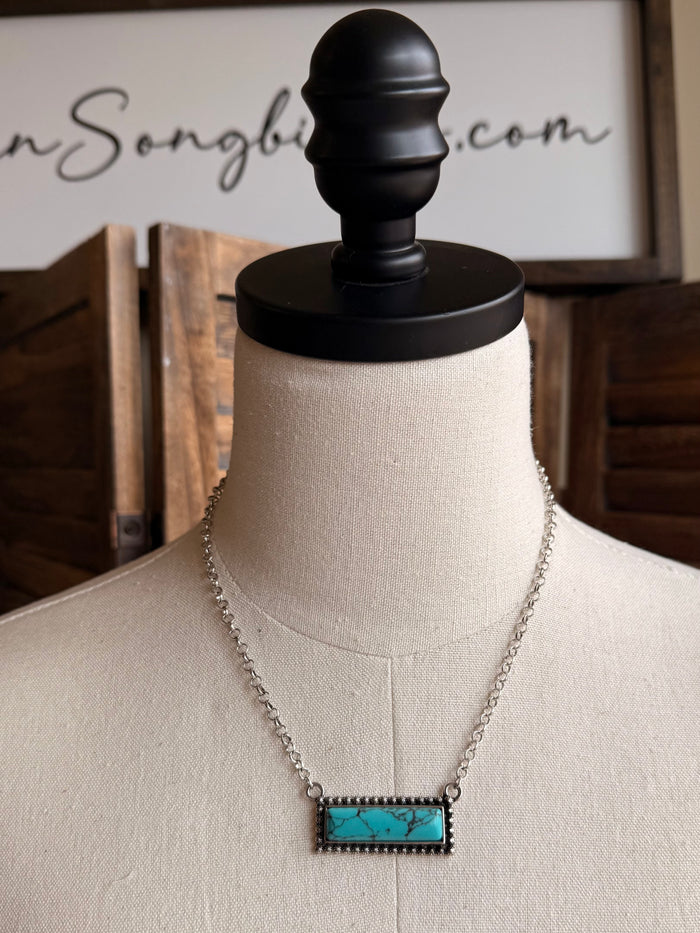 Turquoise bar necklace with rectangular turquoise pendant on a silver chain
