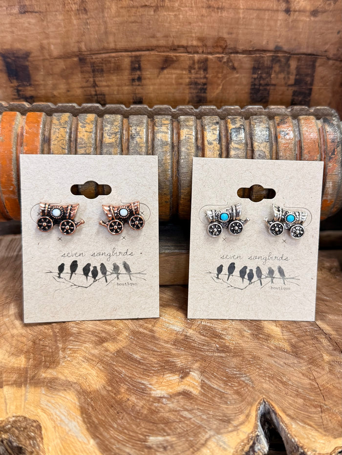 Wagon stud earrings on two cards: copper-toned round studs with turquoise center stones