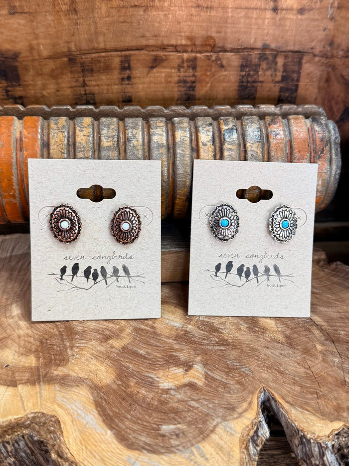 Round concho stud earrings with turquoise center stones, bronze-tone posts