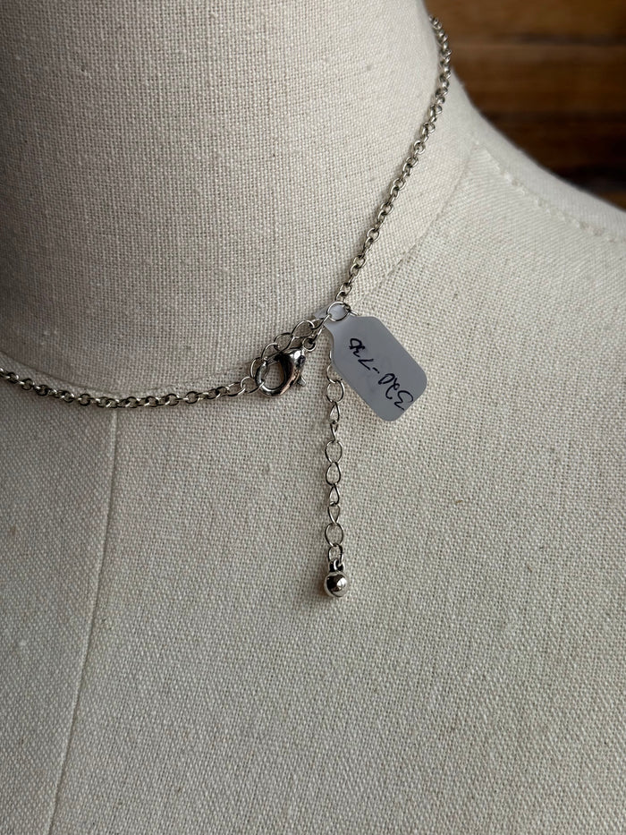 Silver chain necklace with turquoise triangle pendant and dangling charm