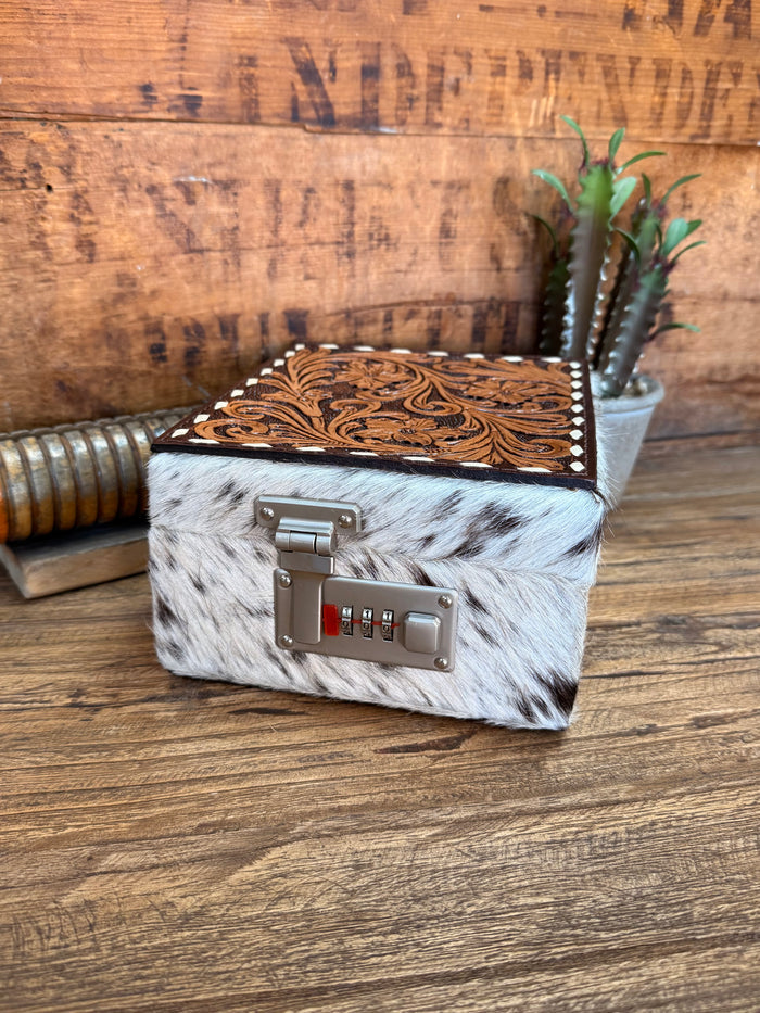 Hair-on jewelry box with metal latch and carved brown leather lid, gray hide