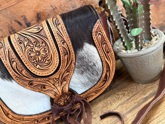 Western tooled hair-on mini crossbody with decorative fringe, black/white hide