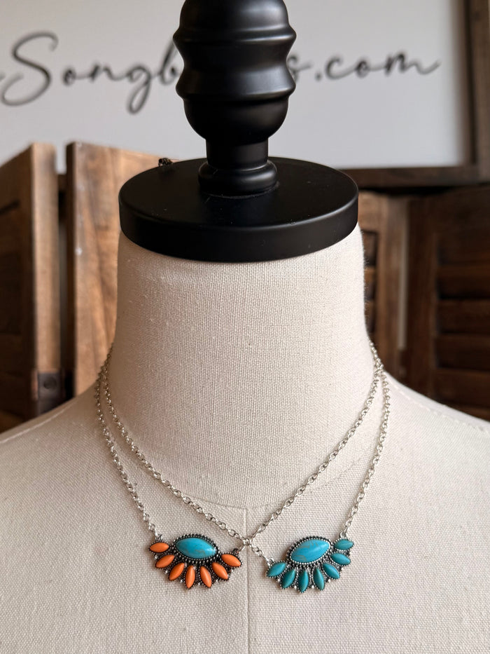 Turquoise and orange fan bar necklace with silver chain and two leaf-shaped pendants