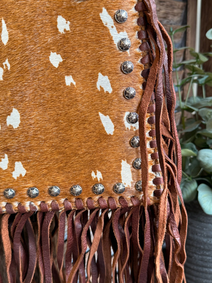 Fringed cowhide coin crossbody purse side, white spots, stud trim, long brown fringe