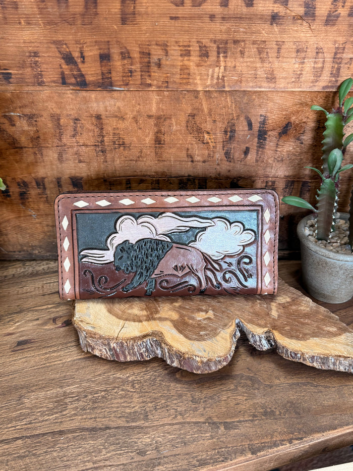Hand-tooled leather checkbook wallet with buffalo tooling and diamond trim border