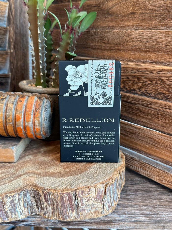 R.REBELLION 50mL perfume box with black floral design and printed label