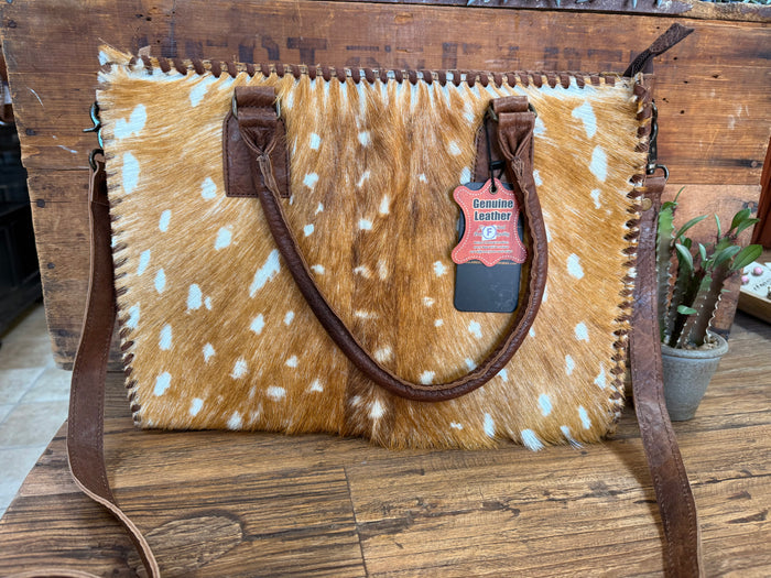 Deer-spotted cowhide briefcase tote with top handle and brown leather straps