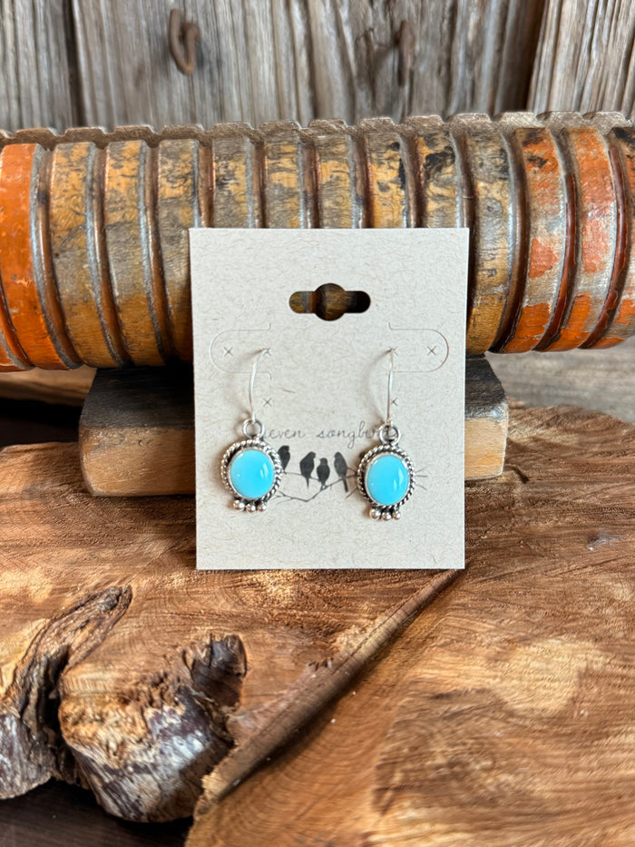 Turquoise round sterling silver fishhook earrings with detailed scalloped bezels