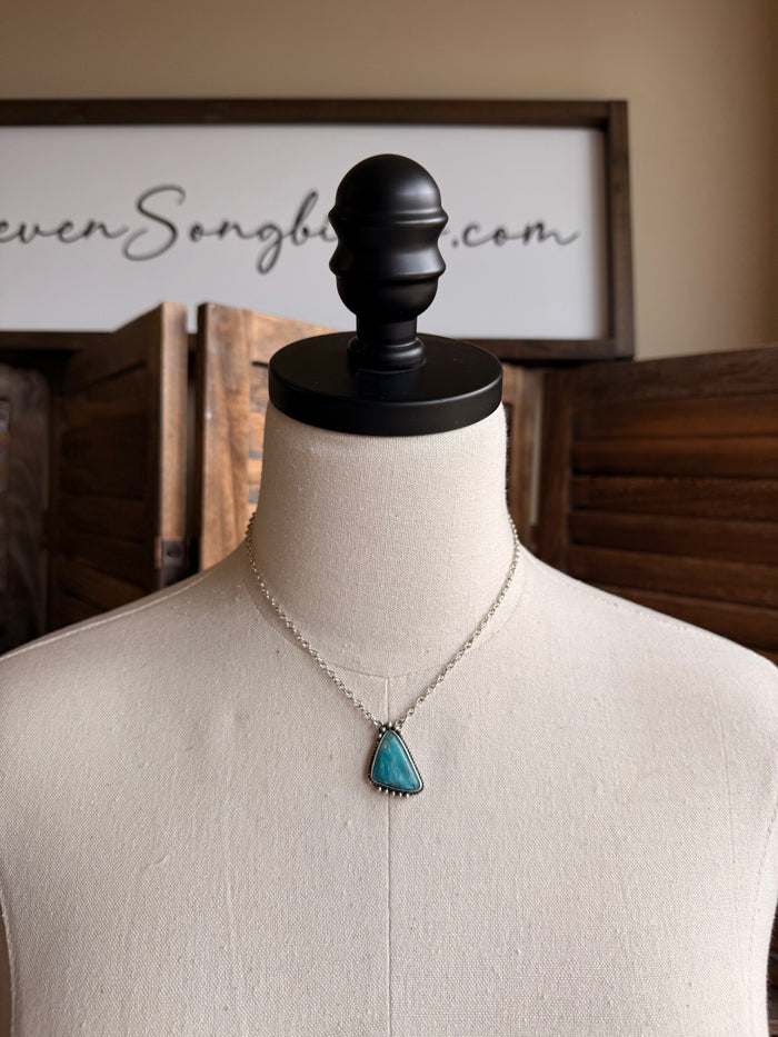 Turquoise triangle pendant necklace on a silver chain