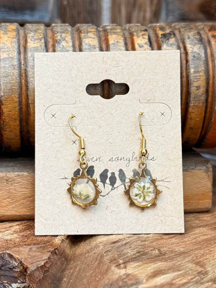 Gold-tone fishhook earrings with pale green dried flower round resin drop charms