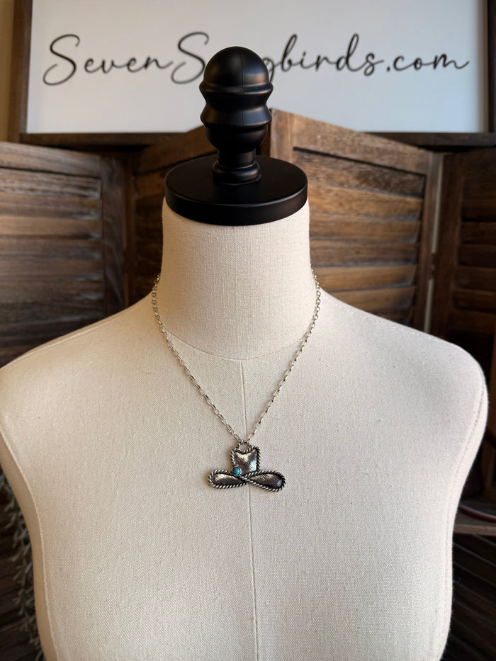 Silver cowboy hat rope necklace with turquoise cabochon pendant on chain