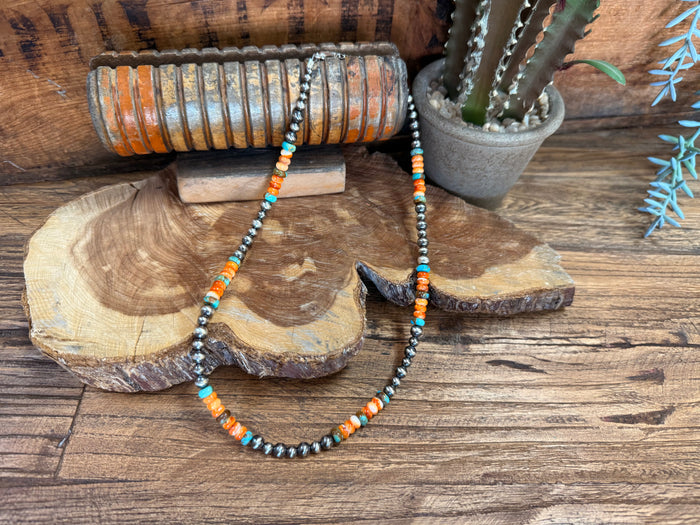 Turquoise and orange bead necklace with dark round metal beads, 17-inch length