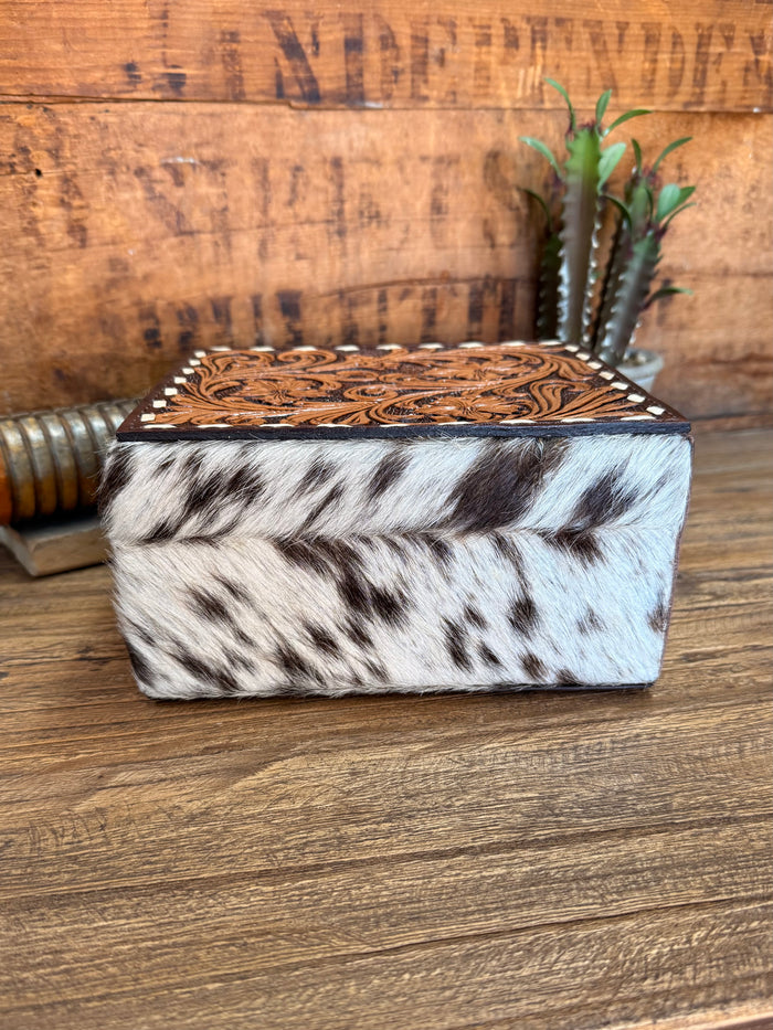 Black-and-white hair-on jewelry box with carved brown lid