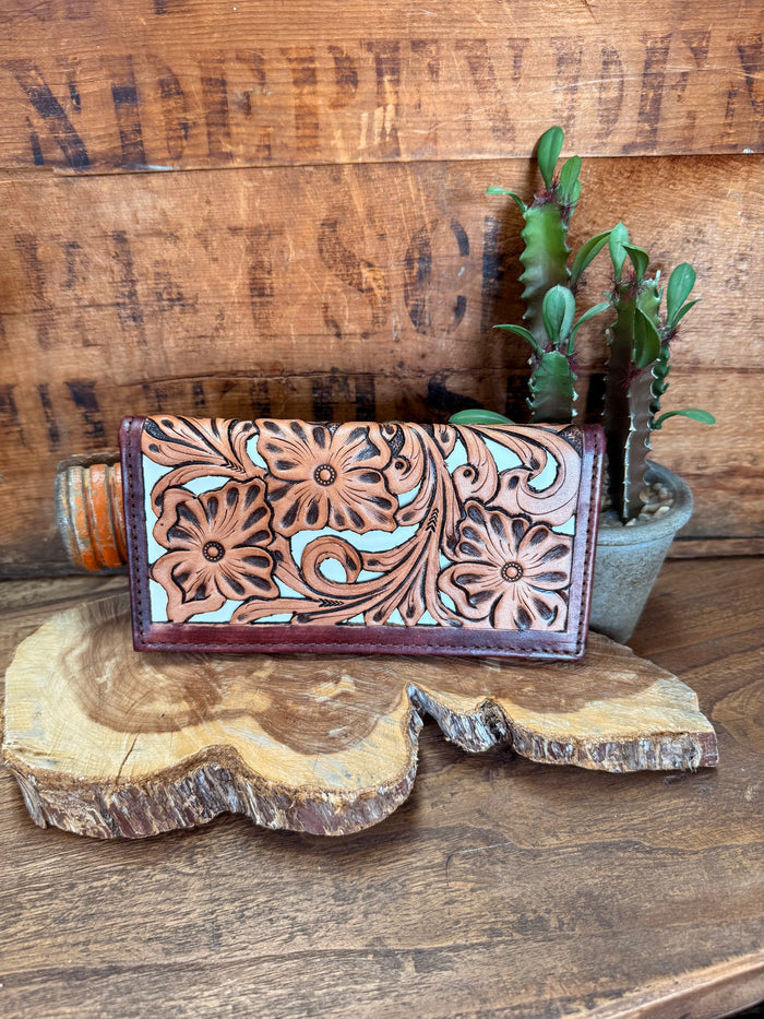 Floral tooled checkbook wallet, dark purple leather with embossed floral pattern and stitching