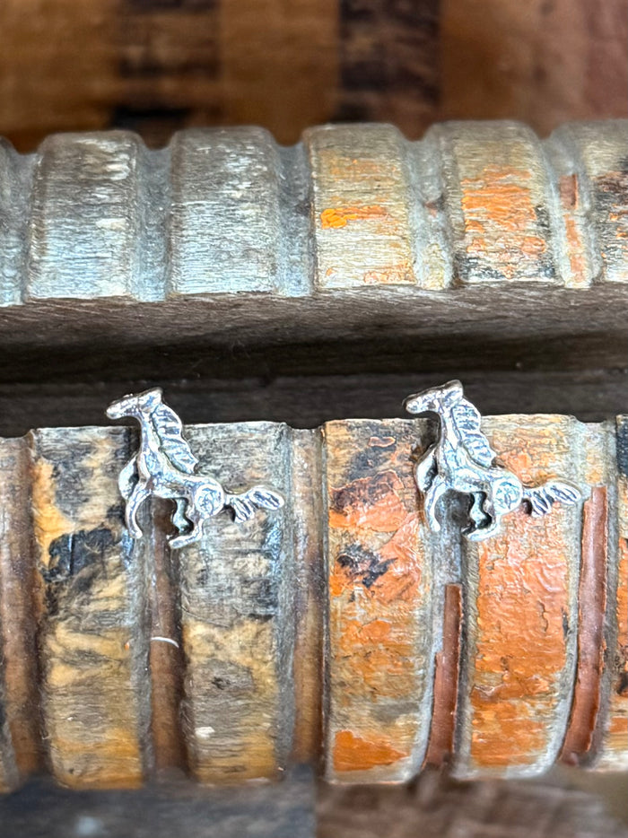 Pair of silver running horse stud earrings with raised horse figures