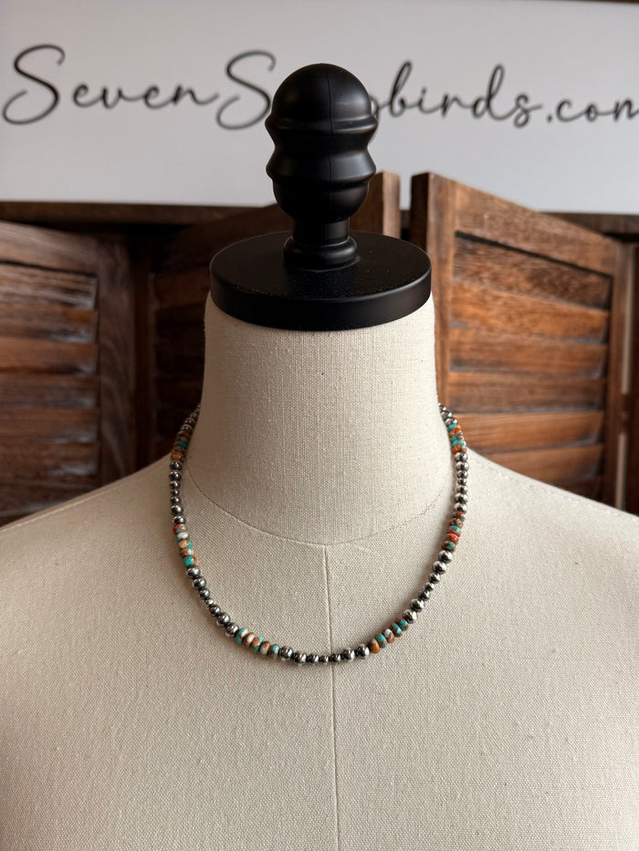 Sterling silver and turquoise spiny bead necklace on mannequin, graduated bead strand