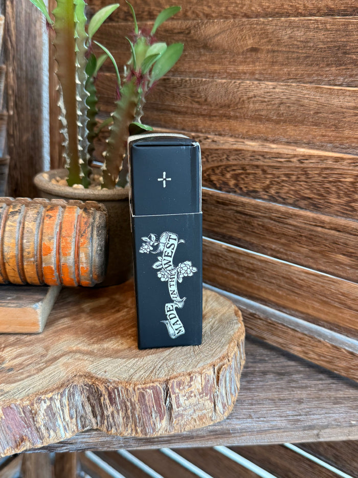 50 mL perfume box side, black with white cross icon and vertical scroll detail