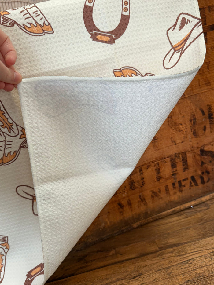 White towel corner with folded edge, underside visible