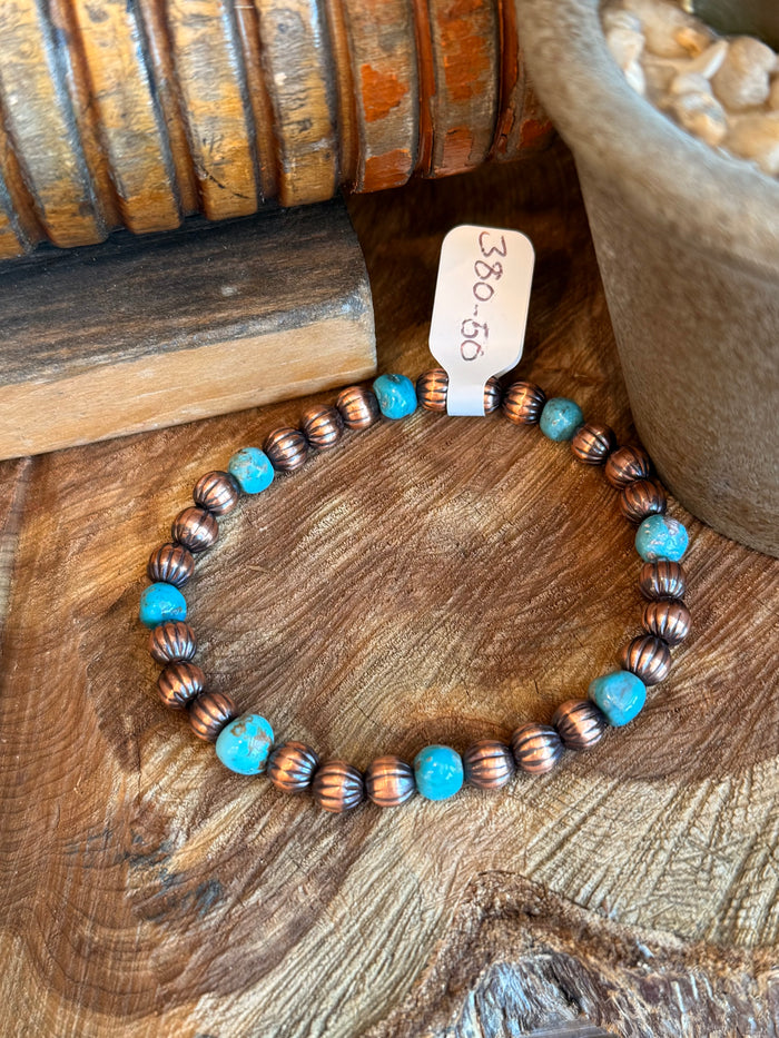 Copper and turquoise bead stretchy bracelet with round turquoise stones and ribbed copper beads