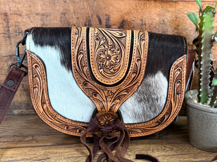 Hair-on mini crossbody purse with western tooled flap, black/white cowhide