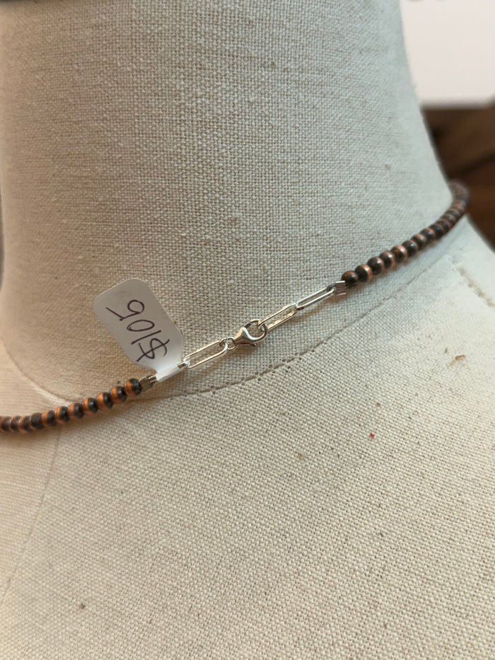 Copper barrel bead necklace with metal clasp and adjustable chain links