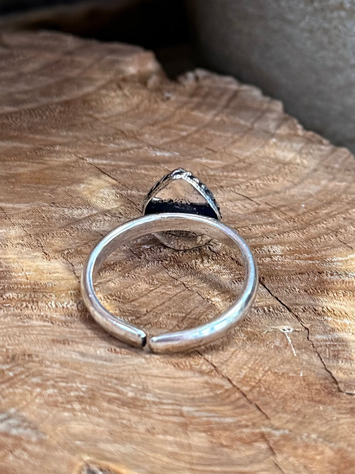 Open-back silver-plated adjustable band ring, oval stone setting